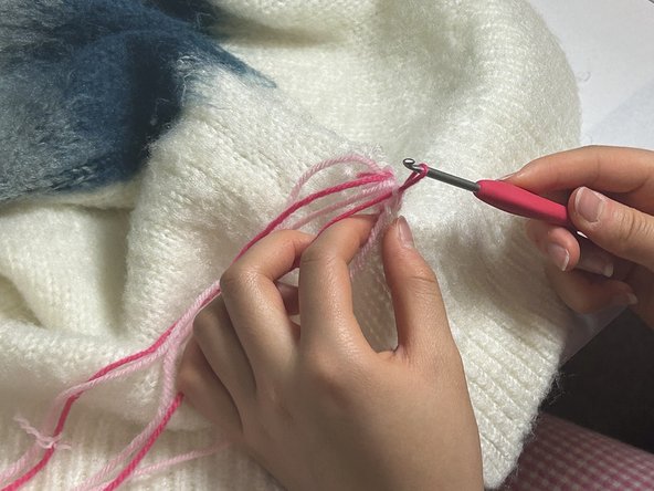 Using Needlework and Crochet to Patch a Hole in Knitwear: step 6, image 2 of 2