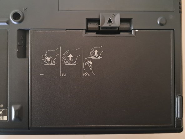 IBM ThinkPad 380 and 385 Battery Replacement, The Battery Release Tab: crwdns2935265:02crwdnd2935265:02crwdnd2935265:02crwdne2935265:0