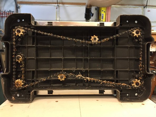 Ridgid R4300 Planer Cutting head with Byrd SHELIX Helical Cutter Head Replacement, Remove elevating shaft gear: crwdns2935265:05crwdnd2935265:02crwdnd2935265:03crwdne2935265:0