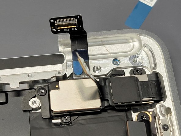 MacBook Pro 13" Two Thunderbolt Ports 2020 Touchbar Replacement, Adhering Flex Cables To Final Bracket: crwdns2935265:047crwdnd2935265:02crwdnd2935265:02crwdne2935265:0