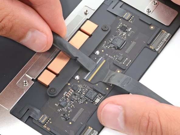 MacBook Air 15" 2024 Trackpad Replacement, Transfer the trackpad cable: crwdns2935265:020crwdnd2935265:02crwdnd2935265:02crwdne2935265:0