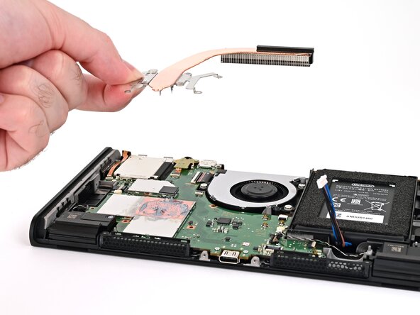 Nintendo Switch 2 Board Replacement, Remove the heat sink: crwdns2935265:037crwdnd2935265:03crwdnd2935265:03crwdne2935265:0