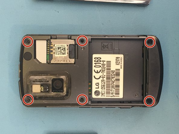 LG KE970 Teardown, Remove 6 screws from the back: crwdns2935265:04crwdnd2935265:02crwdnd2935265:02crwdne2935265:0