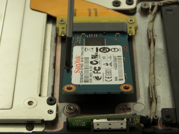 Cr-48 Chromebook SSD Replacement, Locate SSD and Remove Screw: crwdns2935265:05crwdnd2935265:03crwdnd2935265:03crwdne2935265:0