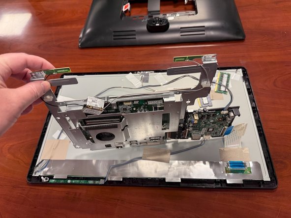 LG Chromebase 22" Teardown, Remove the Motherboard Frame: crwdns2935265:05crwdnd2935265:03crwdnd2935265:03crwdne2935265:0