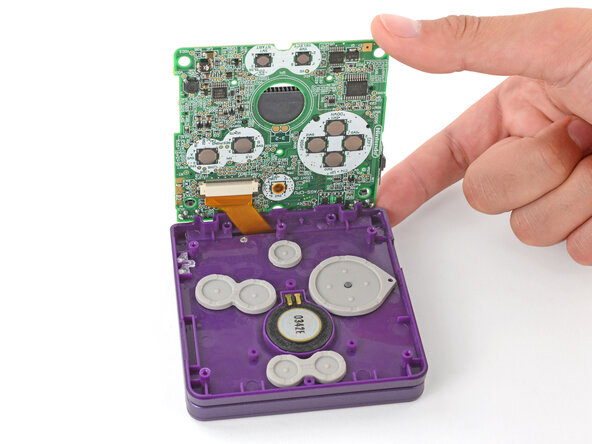 How to Reshell Your Game Boy Advance SP, Lay the motherboard down: crwdns2935265:058crwdnd2935265:01crwdnd2935265:02crwdne2935265:0