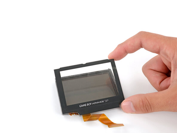 Nintendo Game Boy Advance SP Screen Lens Replacement, Remove the screen lens: crwdns2935265:030crwdnd2935265:02crwdnd2935265:03crwdne2935265:0