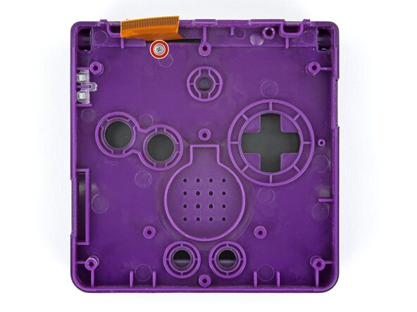 How to Reshell Your Game Boy Advance SP, Install the hinge cover screw: crwdns2935265:050crwdnd2935265:01crwdnd2935265:03crwdne2935265:0