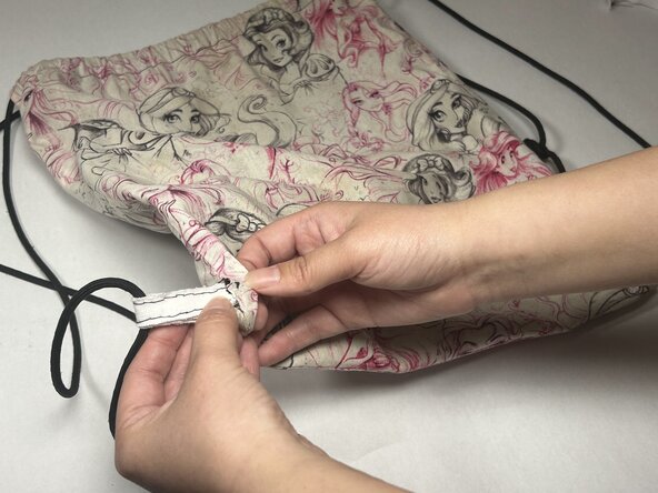 Drawstring Bag Tab Replacement: crwdns2935265:06crwdnd2935265:02crwdnd2935265:03crwdne2935265:0