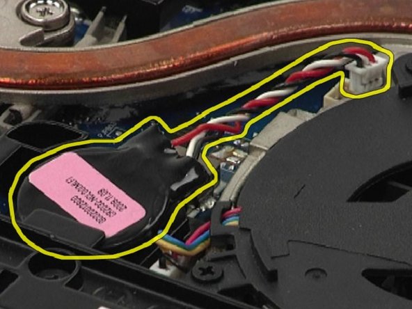 Dell Latitude E6410 CMOS Battery Replacement, Disconnect the coin-cell battery cable from the system board: crwdns2935265:04crwdnd2935265:02crwdnd2935265:03crwdne2935265:0