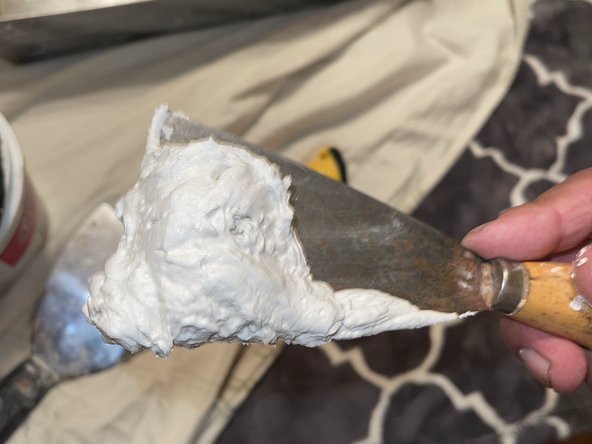 How to Fix Cracked Dry Wall: step 3, image 2 of 2