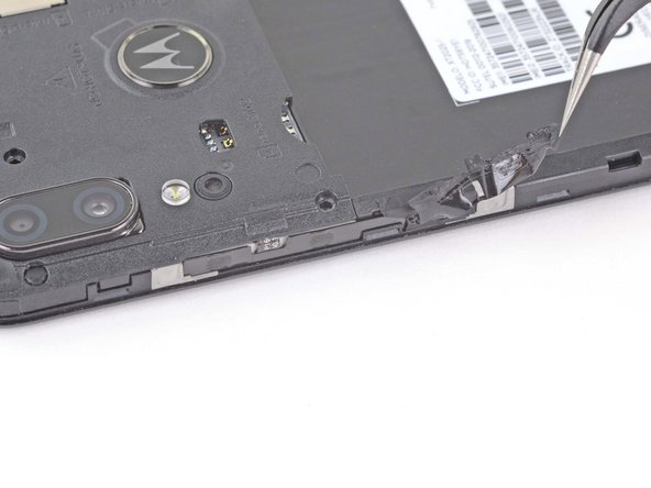 Motorola Moto E6 Plus Motherboard Replacement, Peel back the button sticker: crwdns2935265:09crwdnd2935265:02crwdnd2935265:02crwdne2935265:0