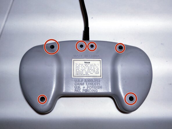 Turbo Touch 360 by Triax for Super Nintendo Entertainment System Teardown, Remove the screws.: step 1, image 1 of 1