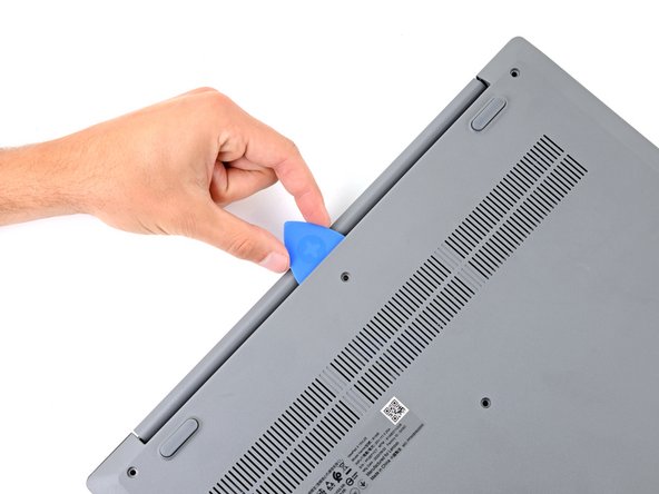 Lenovo IdeaPad 3-15IIL05 RAM Replacement, Release the top clips: crwdns2935265:08crwdnd2935265:02crwdnd2935265:03crwdne2935265:0