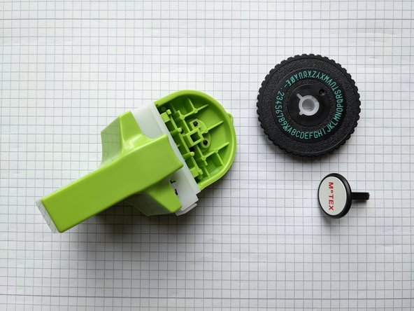 Motex E101 Label Tape Spool Replacement, Remove the daisy wheel: crwdns2935265:03crwdnd2935265:02crwdnd2935265:02crwdne2935265:0