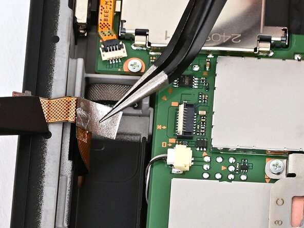 Nintendo Switch 2 Right Joy-Con 2 Connector Replacement, Lift the cable: crwdns2935265:038crwdnd2935265:03crwdnd2935265:03crwdne2935265:0