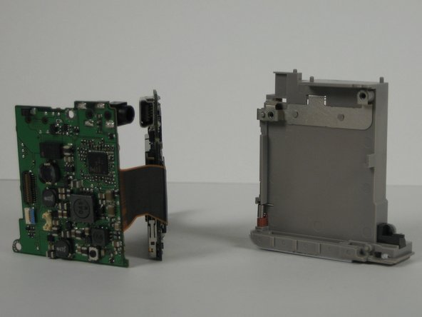 Canon PowerShot SD200 Motherboard Replacement: crwdns2935265:029crwdnd2935265:03crwdnd2935265:03crwdne2935265:0