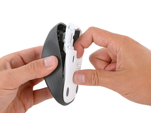 How to Open Your Logitech M310 Wireless Mouse, Separate the mouse halves: crwdns2935265:05crwdnd2935265:02crwdnd2935265:03crwdne2935265:0