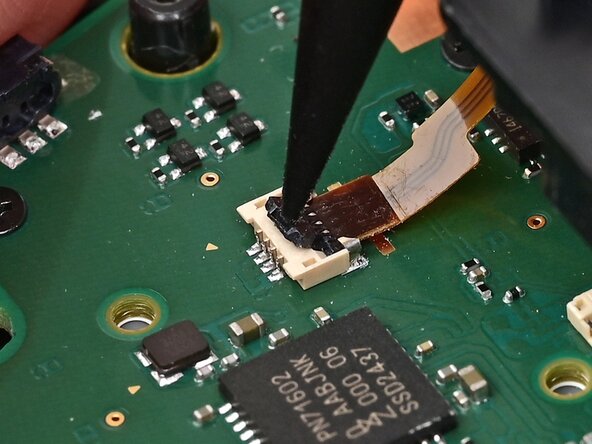 Joy-Con 2 (Right) Joystick Replacement, Disconnect the midframe: crwdns2935265:019crwdnd2935265:03crwdnd2935265:03crwdne2935265:0