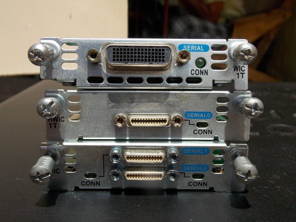 Installation/Removal of the WIC/HWIC card, Insert the card: step 3, image 2 of 2