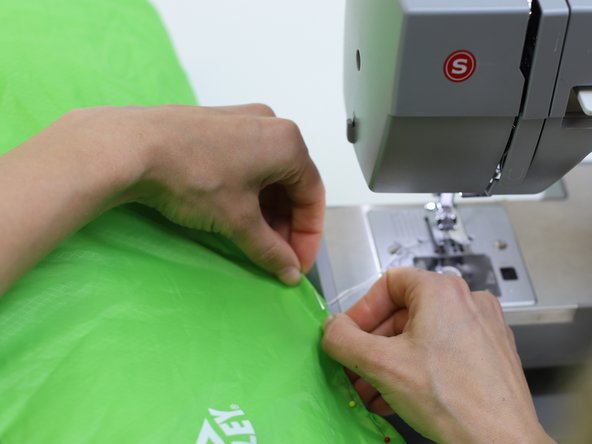 How to Repair a Tear in a Sleeping Bag, Stitch the area: crwdns2935265:03crwdnd2935265:02crwdnd2935265:03crwdne2935265:0