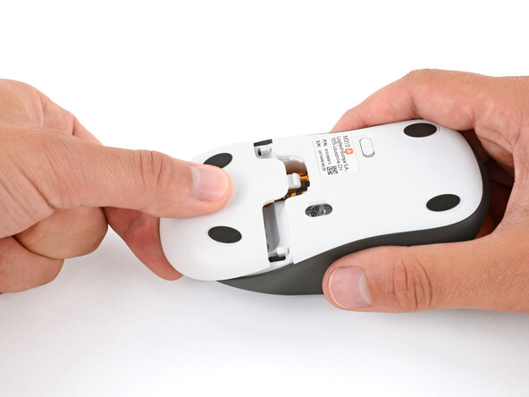 Logitech M310 Battery Replacement, Remove the battery cover: crwdns2935265:02crwdnd2935265:02crwdnd2935265:03crwdne2935265:0