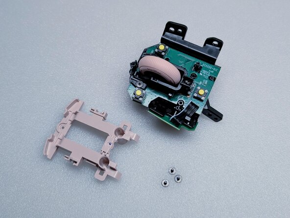 Logitech Lift Teardown, Removing Switch Button Frame: crwdns2935265:017crwdnd2935265:02crwdnd2935265:02crwdne2935265:0