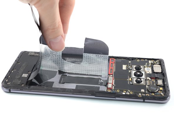 OnePlus 7T Screen Replacement, Remove the plastic film: crwdns2935265:017crwdnd2935265:02crwdnd2935265:03crwdne2935265:0
