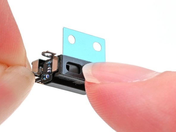 iPhone 16 Plus Microphone Replacement, Apply the adhesive: crwdns2935265:033crwdnd2935265:02crwdnd2935265:03crwdne2935265:0