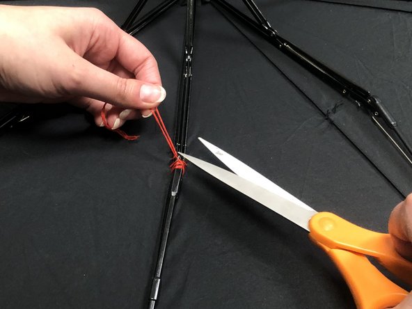 How to Reattach a Metal Rib to Fabric Panel on an Umbrella: step 7, image 1 of 3