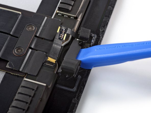 iPad Pro 12.9" 2nd Gen Screen Replacement, Pry up the home button bracket: crwdns2935265:042crwdnd2935265:02crwdnd2935265:02crwdne2935265:0