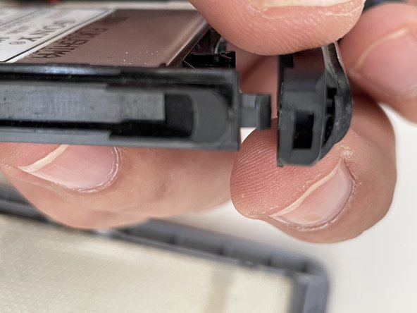 Palm Tungsten W (i710) Teardown, Upper plastic piece 1/2: crwdns2935265:012crwdnd2935265:02crwdnd2935265:02crwdne2935265:0