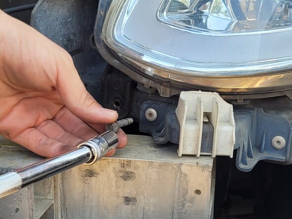 2003-2004 Infiniti G35 Front Headlight Unit Replacement: step 3, image 3 of 3