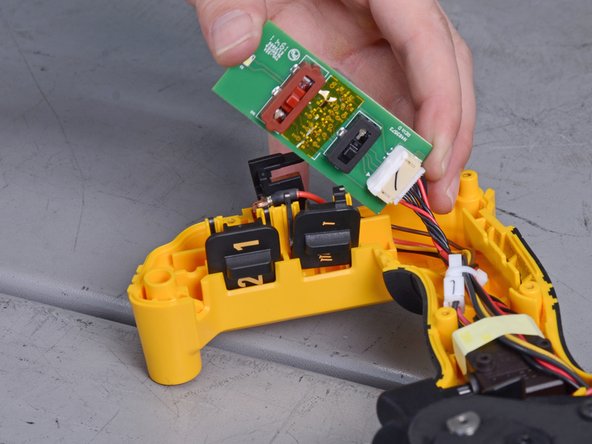 Dewalt Nailers DCN21PL 2018 Solenoid Assembly Replacement, Remove board and switches: crwdns2935265:015crwdnd2935265:03crwdnd2935265:03crwdne2935265:0