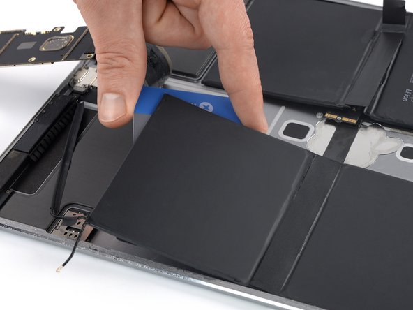 iPad Pro 12.9" 2nd Gen Battery Replacement, Loosen the bottom right battery cell: crwdns2935265:076crwdnd2935265:03crwdnd2935265:03crwdne2935265:0