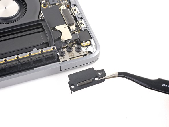 MacBook Pro 13" Four Thunderbolt Ports 2020 Screen Replacement, Remove the hinge covers: crwdns2935265:015crwdnd2935265:03crwdnd2935265:03crwdne2935265:0