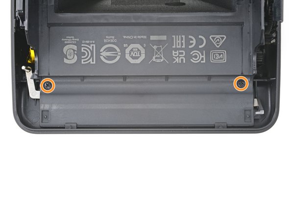 Polaroid I-2 Front Cover Replacement, Unfasten the front cover: crwdns2935265:033crwdnd2935265:02crwdnd2935265:02crwdne2935265:0