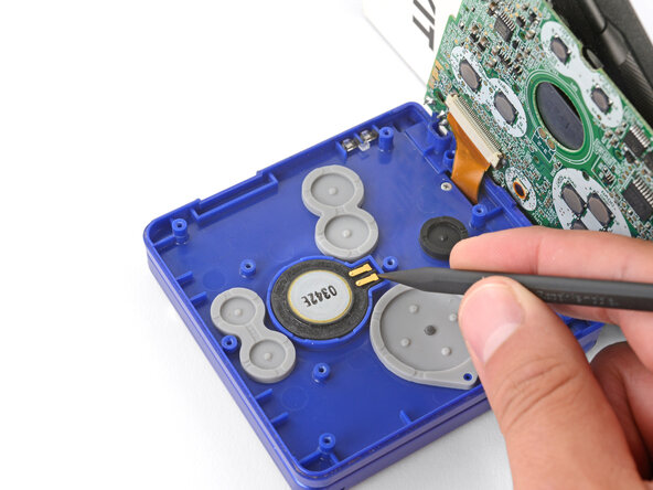 Nintendo Game Boy Advance SP Speaker Replacement, Remove the speaker: crwdns2935265:010crwdnd2935265:01crwdnd2935265:03crwdne2935265:0