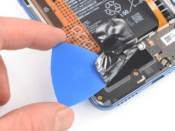 Xiaomi Mi 11 Lite Battery Replacement, Remove the graphite film: crwdns2935265:012crwdnd2935265:02crwdnd2935265:03crwdne2935265:0