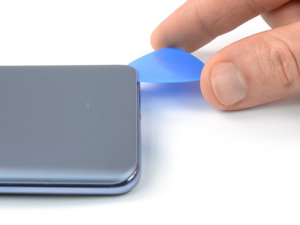 OnePlus Nord 2 5G Battery Replacement, Slice the bottom edge adhesive: crwdns2935265:04crwdnd2935265:02crwdnd2935265:02crwdne2935265:0