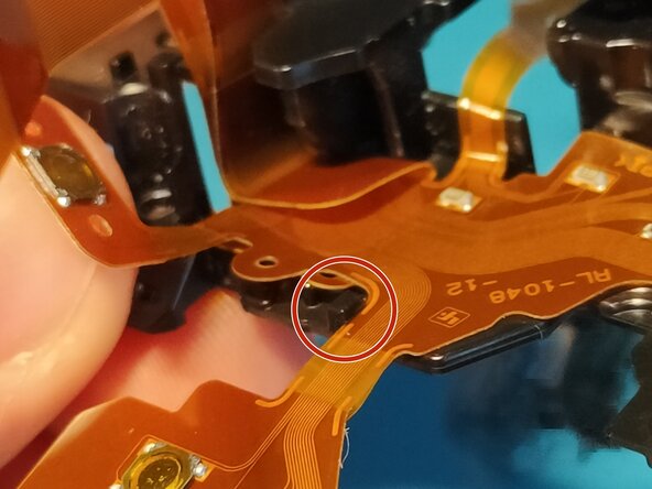 Sony A7 II Top Flex Cable replacement, Inserting it back into the plastic frame: crwdns2935265:035crwdnd2935265:03crwdnd2935265:03crwdne2935265:0