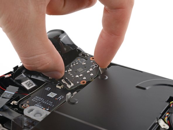 Steam Deck OLED Front Shell Replacement, Remove the right thumbstick: crwdns2935265:055crwdnd2935265:02crwdnd2935265:03crwdne2935265:0
