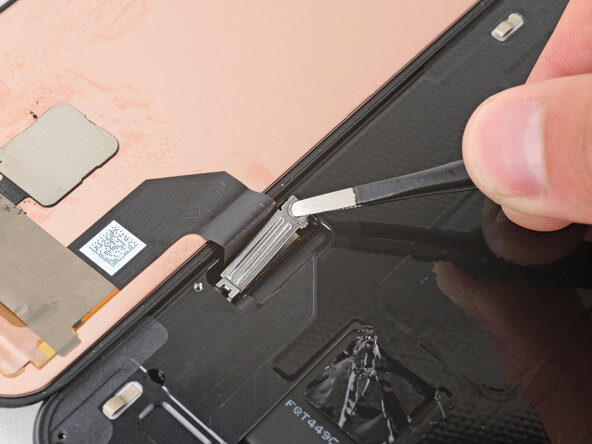 Google Pixel 9a Screen Replacement, Remove the cable cover: crwdns2935265:017crwdnd2935265:02crwdnd2935265:03crwdne2935265:0