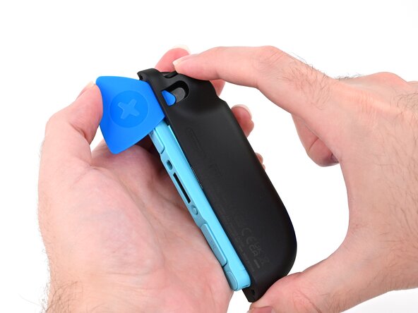 Joy-Con 2 (Left) Battery Replacement, Install the back cover: crwdns2935265:021crwdnd2935265:03crwdnd2935265:03crwdne2935265:0