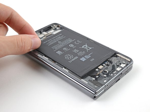 How to Apply New Flip Battery Adhesive in Your Google Pixel Fold, Secure the battery: crwdns2935265:07crwdnd2935265:02crwdnd2935265:03crwdne2935265:0