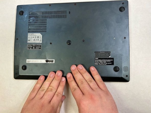 MSI Modern 14 A10M Laptop Battery Replacement, Click Back Cover into Place: step 17, image 3 of 3