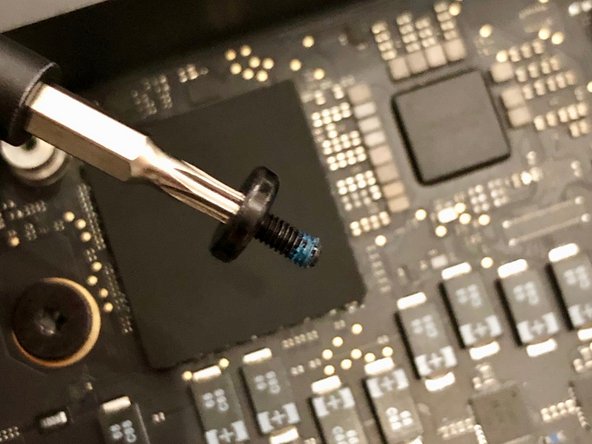 Mac mini Late 2018 Disassembly, Next, the motherboard: crwdns2935265:08crwdnd2935265:03crwdnd2935265:03crwdne2935265:0