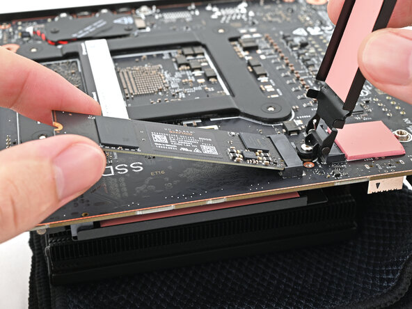 How to Install a Framework Desktop Mainboard Into a Mini‑ITX Case, Install the secondary storage: step 5, image 2 of 2