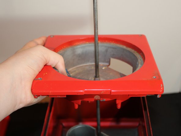 How to Fix a Stuck Quarter in a  Candy Machine: step 5, image 2 of 2