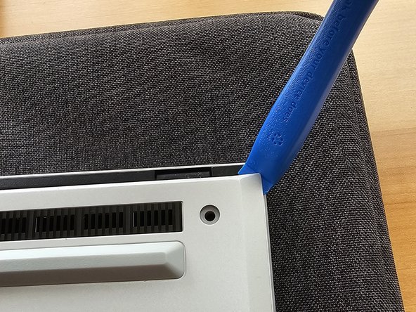 Asus ROG Zephyrus G14 (2024) m.2 SSD Drive Replacement, Pry Open the Bottom Cover: crwdns2935265:03crwdnd2935265:02crwdnd2935265:03crwdne2935265:0